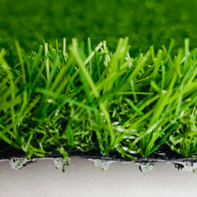 Césped sintético sin relleno de 25 mm hierba artificial de alto Dtex para campos deportivos y decoraciones de paisajes